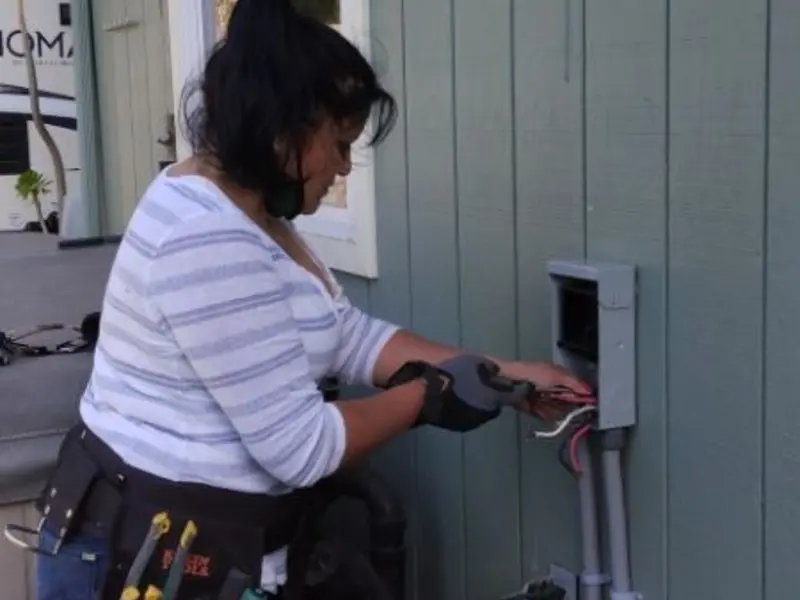 Licensed electrician wiring an exterior subpanel in Mount Orab