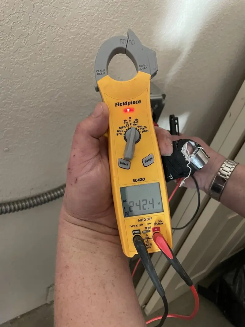 Voltage testing with clamp meter during Circuit Breaker Repair in Mount Orab